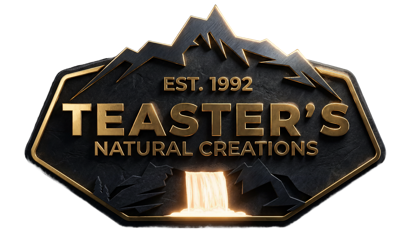Teaster's Natural Creations — carved stone and gold emblem